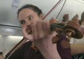 Irish Woman Celebrates Saint Patrick's Day With Fiddle Session on Flight to Dublin