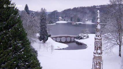 Drone video of world-famous Stourhead gardens enveloped in snow
