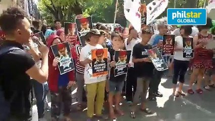 Members of Akbayan call for the resignation of Justice Secretary Vitaliano Aguirre II