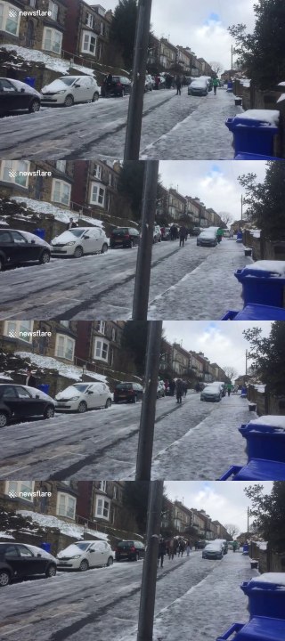 Sheffield residents slide down icy road on way to work