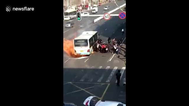Bus passengers stampede after vehicle bursts into flames