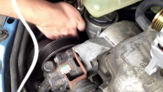 How to replace an Alternator on a 2000 Ford Focus