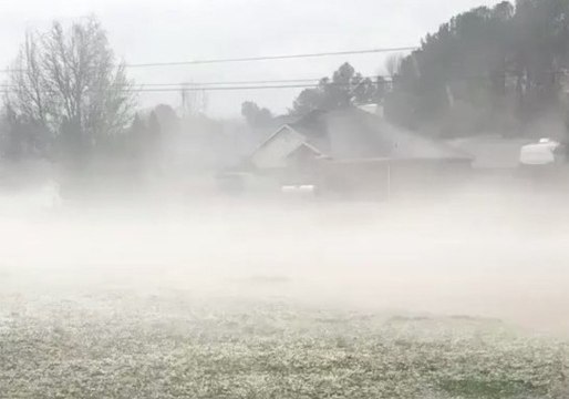 Fog Drifts Over Hail After Alabama Severe Storm