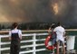 Residents Retreat to Tathra Beach as Bushfire Destroys Homes