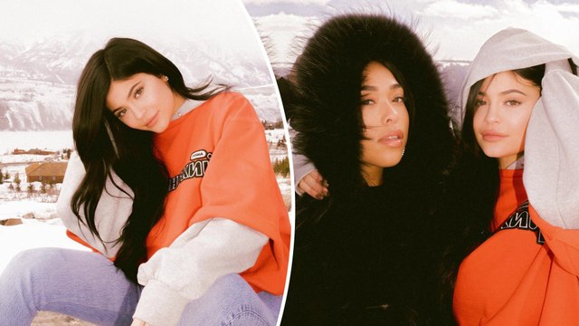 Snowed in! Kylie Jenner models orange sweatshirt as she enjoys winter holiday... six weeks after welcoming Stormi.