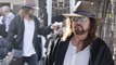 Billy Ray Cyrus lugs guitar and signs autographs for fans as he arrives in Sydney ahead of first Australian tour in 18 years... with daughter Miley set appear on stage.