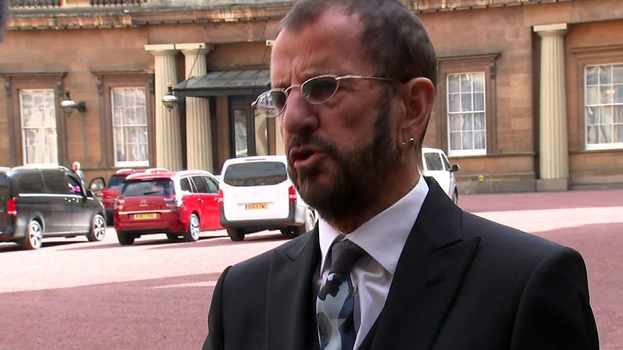 Beatles drummer Ringo Starr knighted at Buckingham Palace
