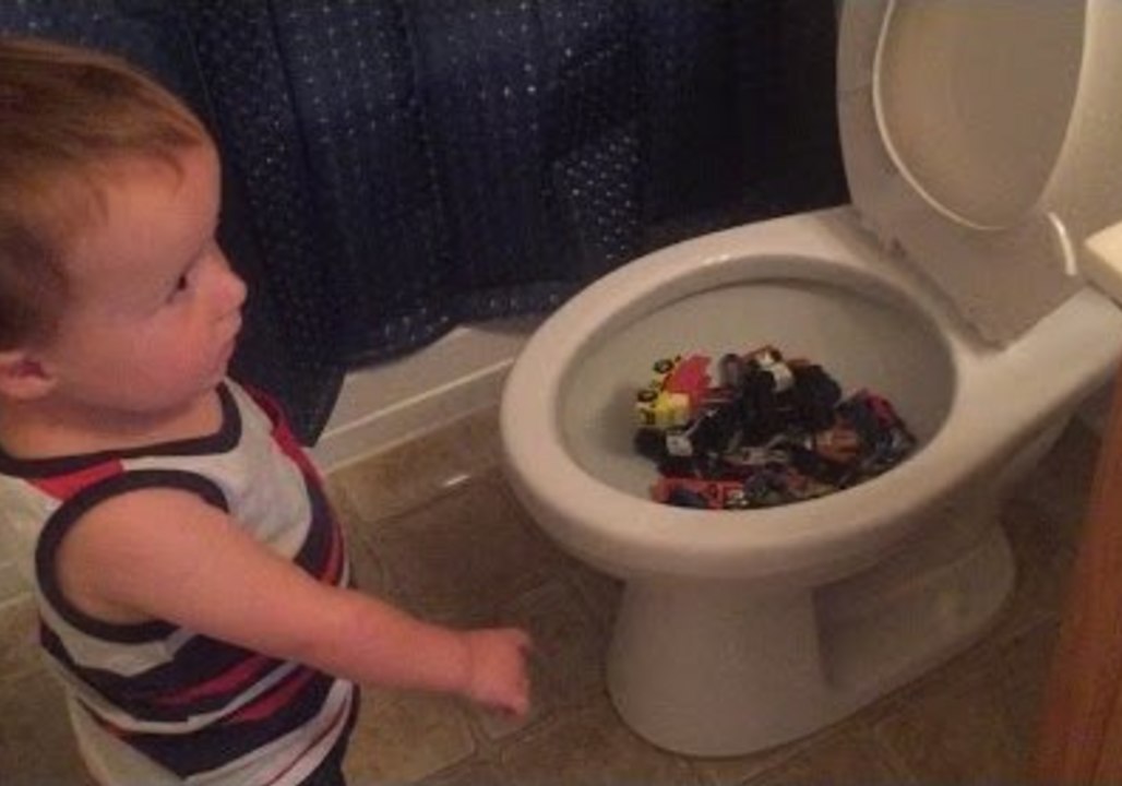 Little Boy Clogs Toilet With Toy Cars