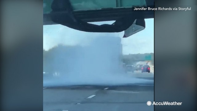 Snow on tractor trailer clips overpass, knocks netting dangerously into oncoming traffic