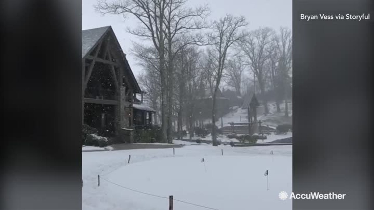 Snow falls in North Carolina as storm moves through