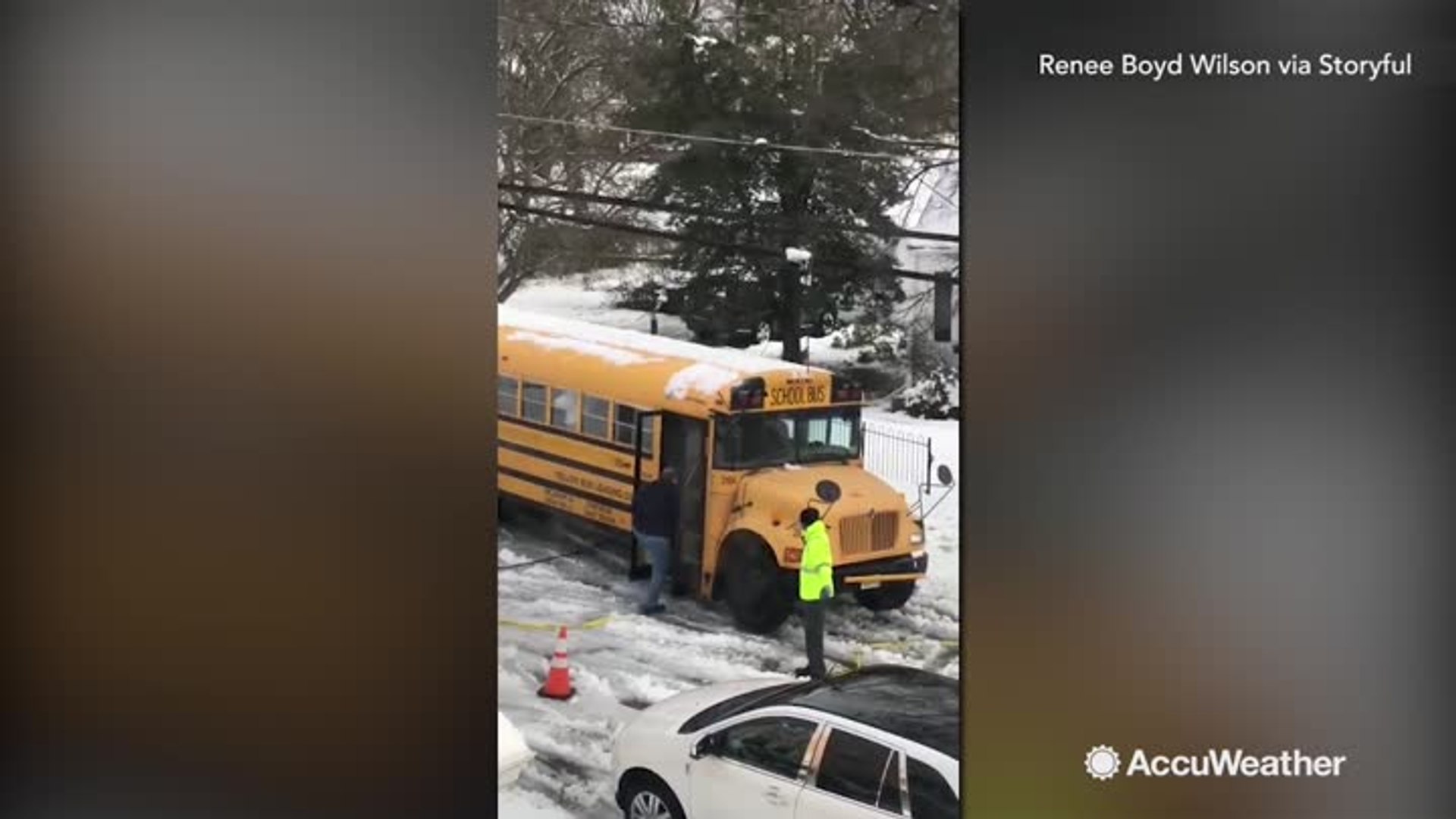 ⁣Debris from nor'easter blocking road doesn't stop this school bus driver