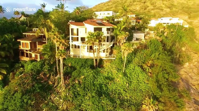 Daredevils cliff jump on Hawaiian paradise island