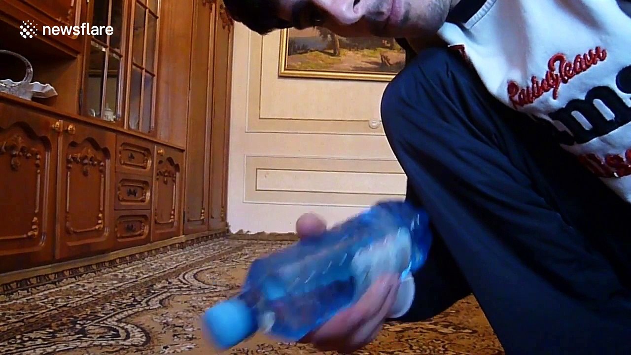 Man performs TWO-FINGERED push-ups while drinking water