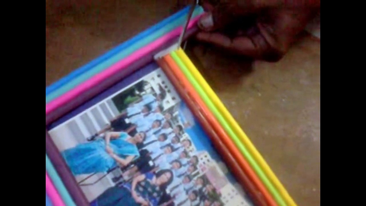 2 models of photo frame - one using color paper rolls and other using popsicle s