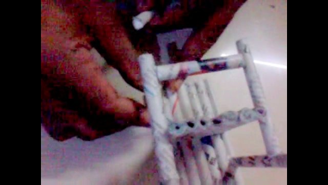 Two models of chirs -craft - one using popsicle sticks and other using news pape
