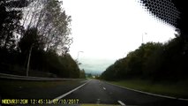 Dash-cam captures car slamming into guardrails after a dangerous pass