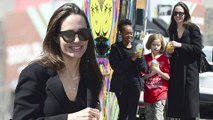Cool mom! Angelina Jolie, 42, treats Vivienne and Zahara to frozen desserts... after revealing her six kids 'don't really do a lot of social media'
