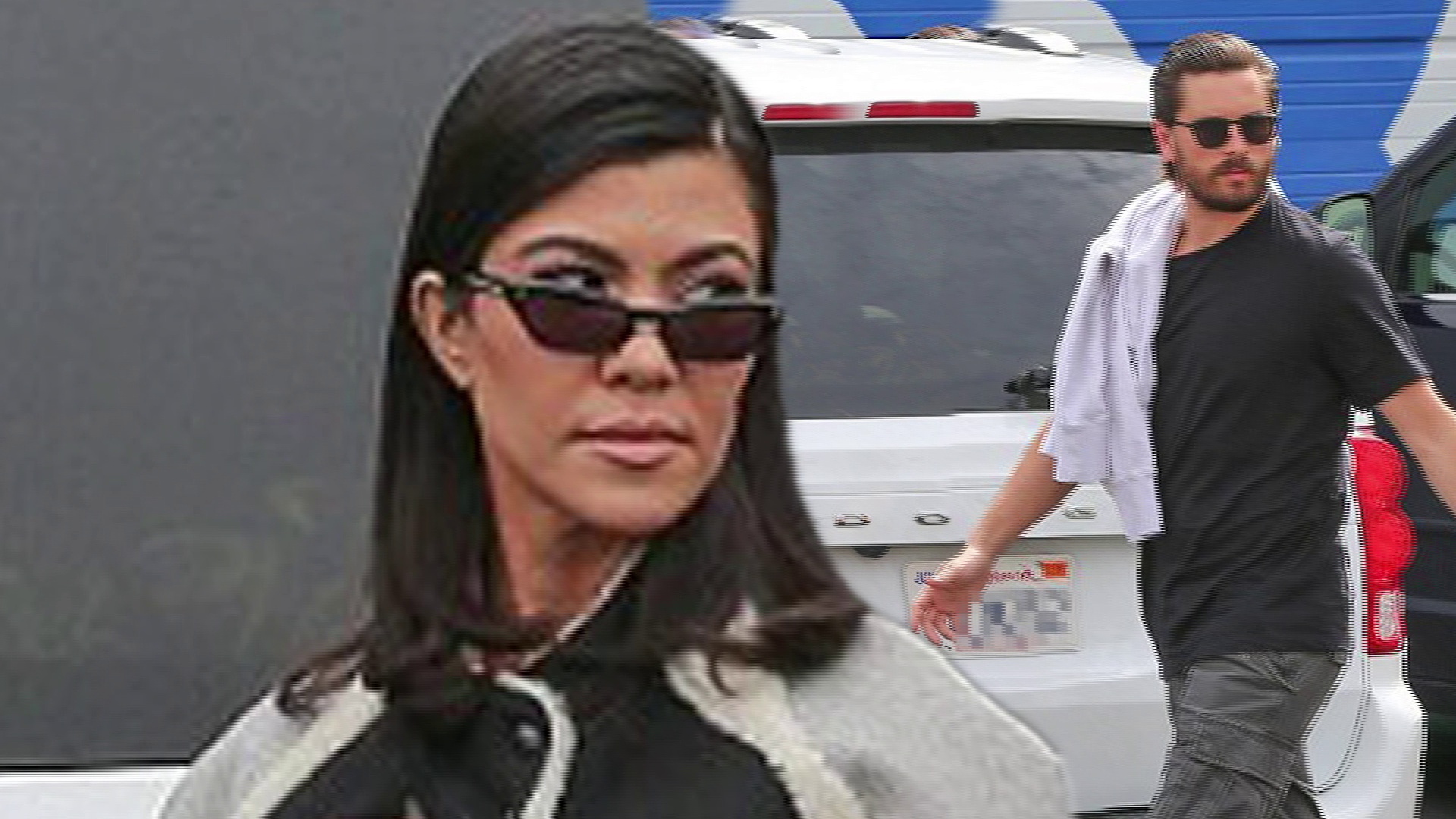 Amicable exes! Kourtney Kardashian is all business in flowy trousers as she and Scott Disick step out in Los Angeles suburbs.