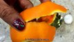 Make a Beautiful Orange Peel Flower Candle - DIY Home - Guidecentral