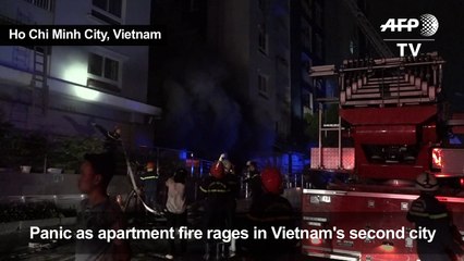 Firefighters rescue survivors after Vietnam blaze