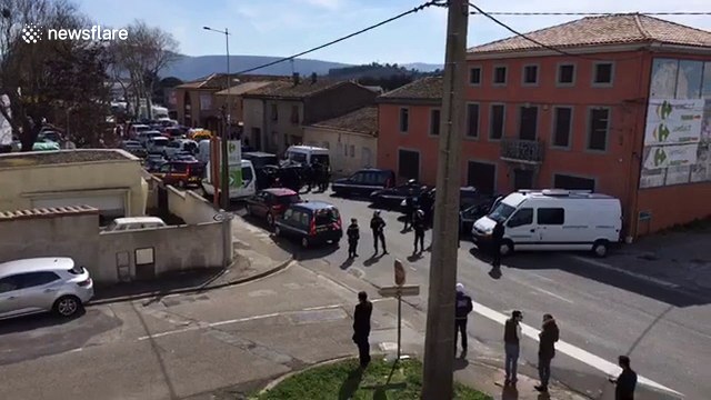 'ISIS gunman' kills one and takes hostages at French supermarket