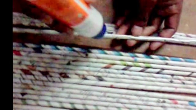 DIY_ How to make pen stand cum phone stand using news paper rolls - news paper c