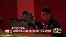 Phoenix officer hurt trying to break up a fight