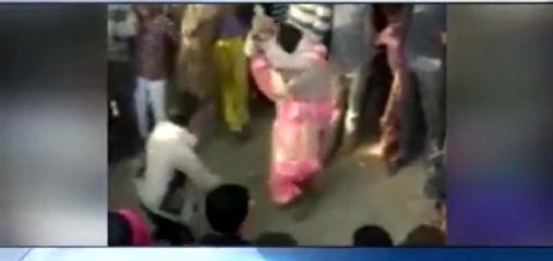 Shameful : Husband beats woman in public on Panchayat's order : Uttar Pradesh