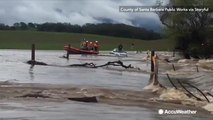 Raging floods trap cars in California