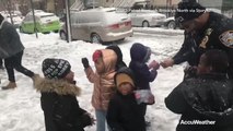 NYPD officers lose snowball fight to adorable opponents