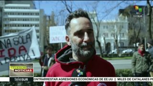Españoles marchan para exigir liberen a activistas pro refugiados