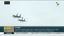 Fuerza aérea china realiza ejercicios militares en sus aguas