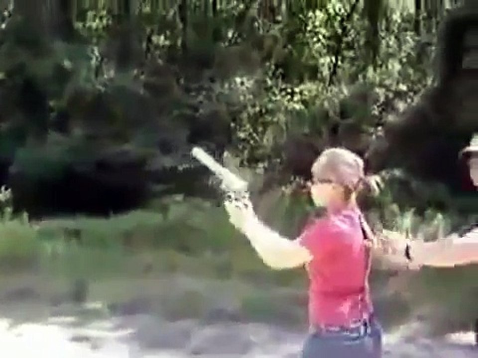 Girl Shooting a Big Gun = FAIL