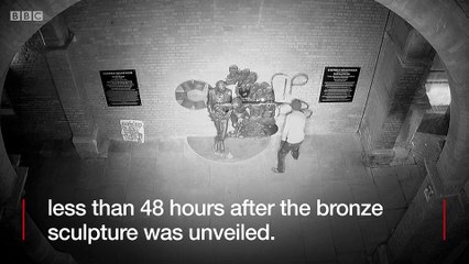 The vandal spent about two minutes spraying the artwork, wall and pavement