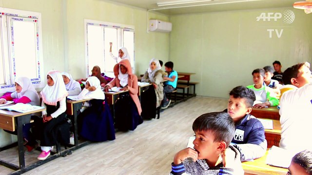 Iraqi Roma village school reopens after 14 years