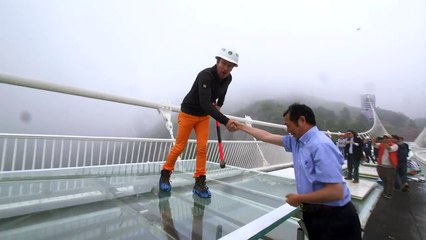 China's giant glass bridge hit with sledgehammer - BBC Click