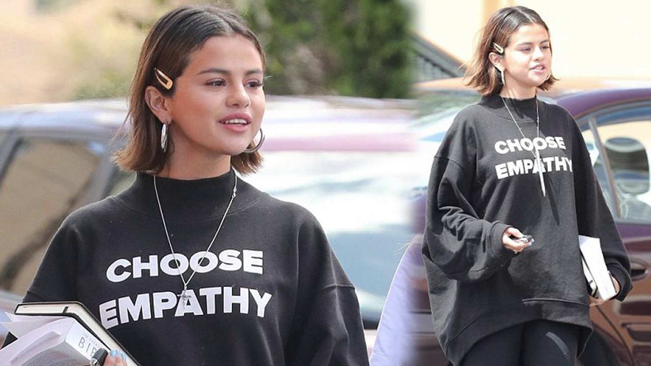 'Choose empathy': Selena Gomez sports suggestive sweatshirt as she carries a bible and heads to lunch with friends after fun-filled weekend.