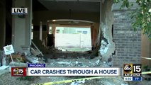 Police: Suspected impaired driver crashes through Phoenix house