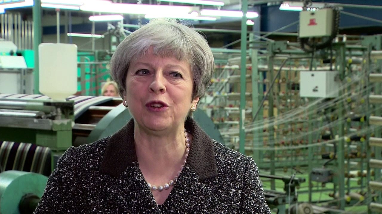 May lays out post-Brexit trade plans for the UK