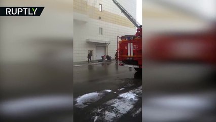 Person jumps from burning shopping center in Kemerovo, Russia (GRAPHIC)
