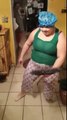 Lady dancing with a broom to a Puerto Rican song 2018 (Funny Dance)