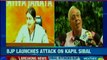 Smriti Irani launches crucial attack on Congress; Kapil Sibal rebuts