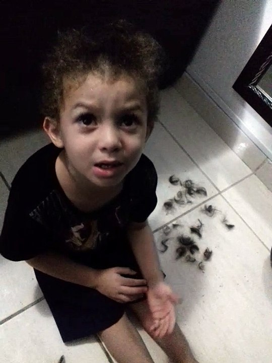 Kid Gives Himself a Haircut