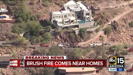 Brush fire near homes on Camelback Mountain