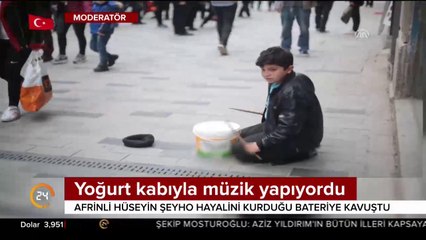Yoğurt kabıyla ritim tutan Afrinli Hüseyin Şeyho'nun baterisi var