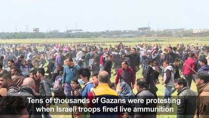 Bloody clashes as thousands of Gazans march near Israel border