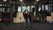 L'exercice du squat + elevation des bras avec haltères