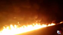Guy Leaves 'Trail Of Fire' After Driving Burning Fuel Tank To Safety