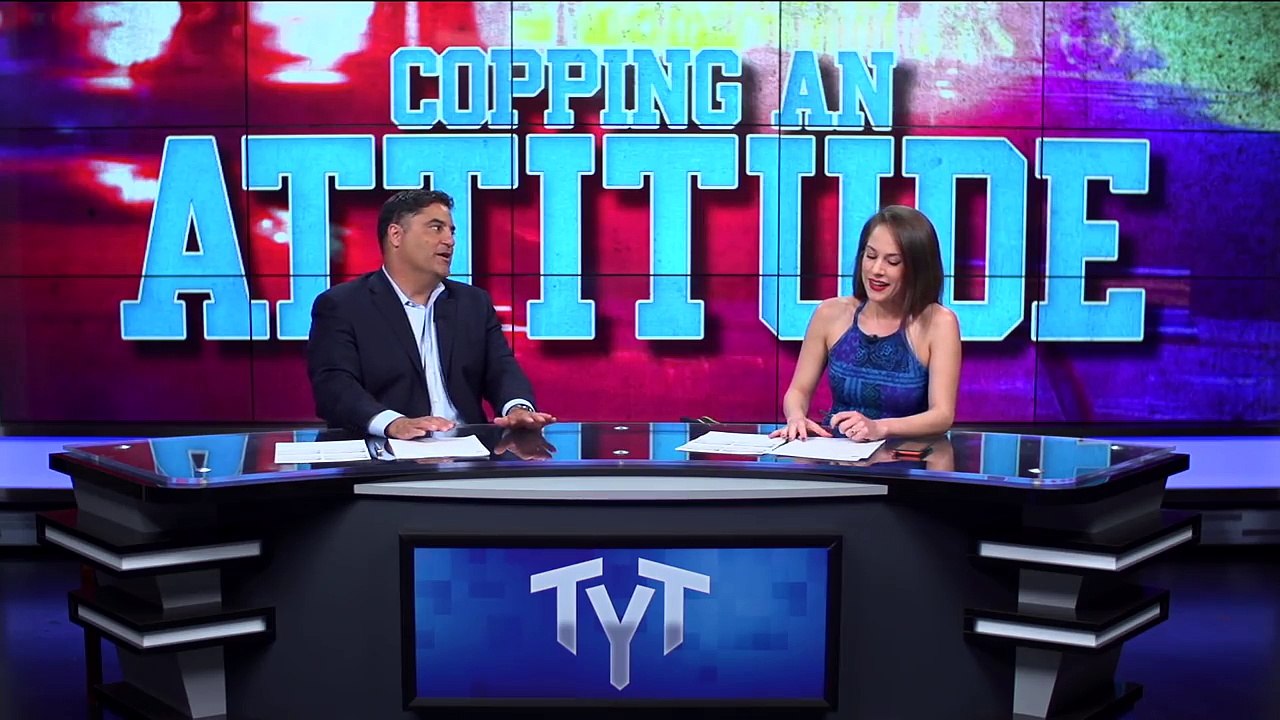 Cop Freaks Out When Armed Residents Answer Door