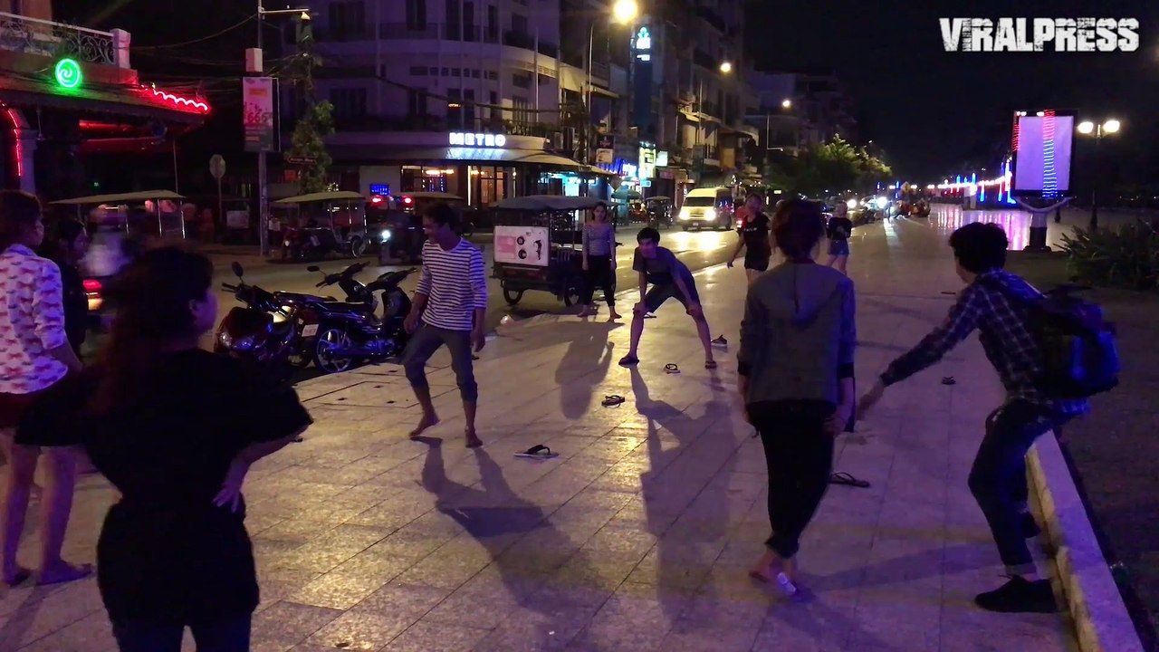 Teenagers Playing Tag Late At Night